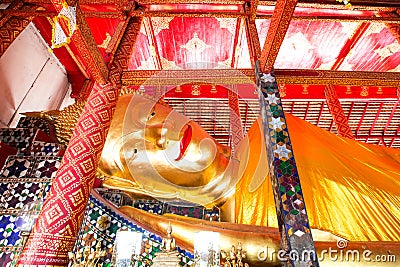 Reclining Golden Buddha at Wat Phra Non Nong Phueng Stock Photo