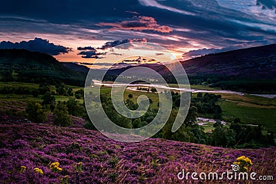 Beautiful Red and Orange Braemar Mountain Sunset landscape Stock Photo