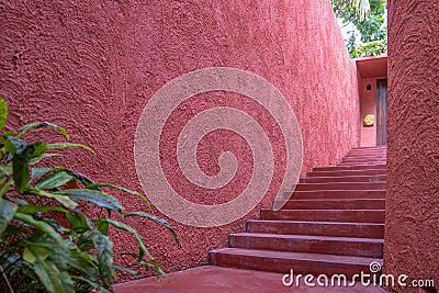 Beautiful red unique walkway wall with abstract texture all around Stock Photo