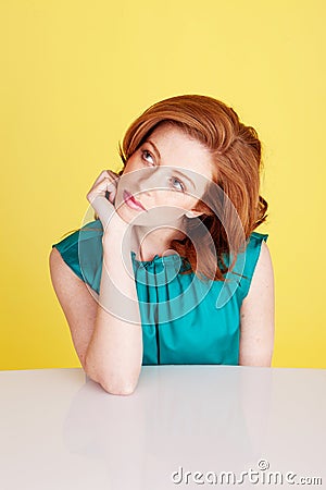 Beautiful Redhead Woman Thinking Stock Photo