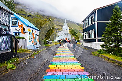 Beautiful Reflection of Houses, Church, Highway and Rainbow Road in Seydisfjordur Town in Iceland in August Editorial Stock Photo