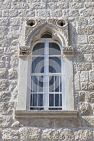 Beautiful renovated window in a stone house Stock Photo