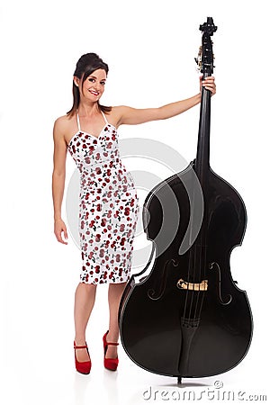 Beautiful Rockabilly Girl with Double Bass Stock Photo