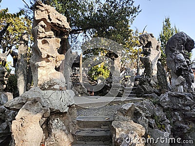 Beautiful rocks inside the Lion Grove Garden in Suzhou China Editorial Stock Photo