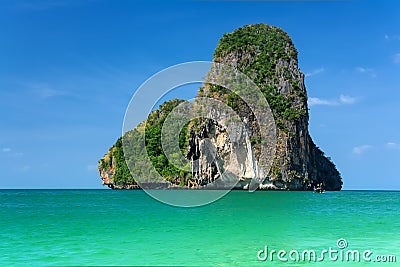 Beautiful rocky island over blue sky Stock Photo