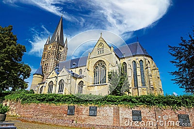 Beautiful roman gothic abbey church in rural village in summer Editorial Stock Photo