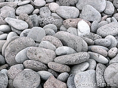 Beautiful round gray stones on a beach Stock Photo