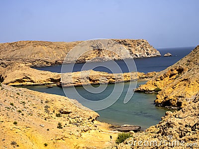 Beautiful rugged northeast coast of Indian Ocean. Oman Stock Photo