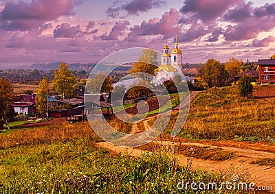 Beautiful rural landscape autumn orthodox white Church road Stock Photo