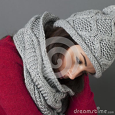 Beautiful 20s girl expressing sorrow and disillusion Stock Photo