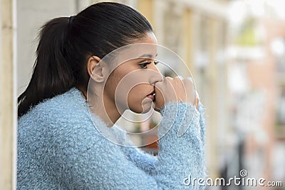 Beautiful sad and desperate hispanic woman suffering depression thoughtful frustrated Stock Photo