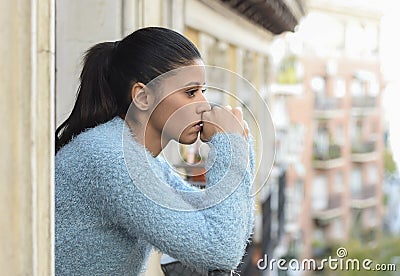 Beautiful sad and desperate hispanic woman suffering depression thoughtful frustrated Stock Photo