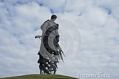 Beautiful sad monument to Russian warrior died in World War II. Weapons in hands and cranes fly away. Russia, Tver Editorial Stock Photo