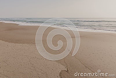Beautiful sand beach with soft ocean wave, wave of the blue sea on the sand bech. concept travel Stock Photo