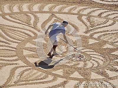 Beautiful sand mandala with its artist named Vitor Raposo Editorial Stock Photo