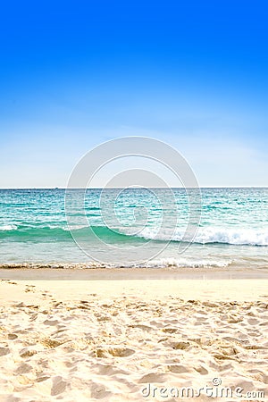 Beautiful sandy beach against blue sky Stock Photo