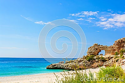 Beautiful sandy beach with a cliff. ionian sea in Dhermi, Albania Stock Photo