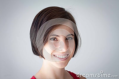 Beautiful, saucy short-haired teen with brown hair Stock Photo