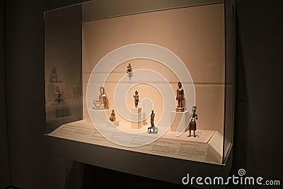 Beautiful scene of Chinese artifacts in large glass case,Cleveland Art Museum,Ohio,2016 Editorial Stock Photo