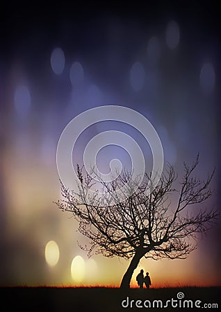 Beautiful scene of loving couple on sunset Stock Photo