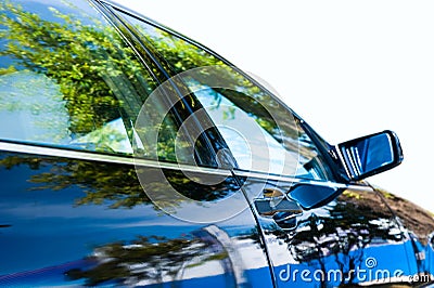 Beautiful scene reflected on car Stock Photo