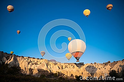 beautiful scenery flight of balloons in the mountains of Cappadocia Stock Photo