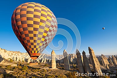 beautiful scenery flight of balloons in the mountains of Cappadocia in love valley Editorial Stock Photo