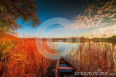 Beautiful scenic lake landscape with boat Stock Photo