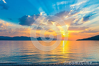 Beautiful scenic sunrise over the a quiet Sea Stock Photo