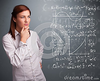 Beautiful school girl thinking about complex mathematical signs Stock Photo