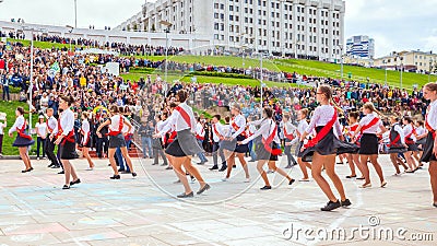 Beautiful school graduates dance a waltz at the city open holiday the last call Editorial Stock Photo