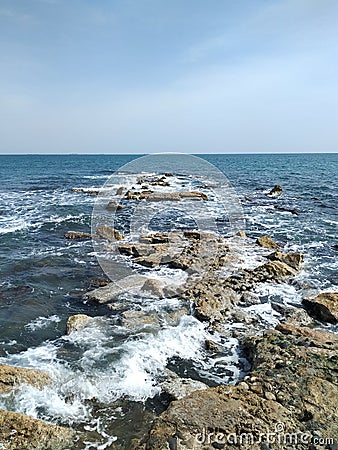 Beautiful Sea, Rocks And Horizon Background Stock Photo