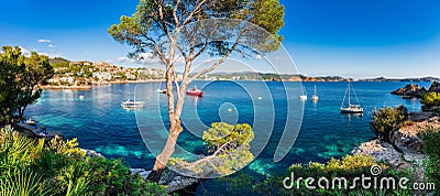 Beautiful sea view scenery of bay with boats on Majorca island, Spain. Stock Photo