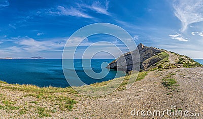 Beautiful seascape, panorama of cape Kapchik to the Galitsin Trail and blue bay of the Black Sea. Sudak, New World. Landscape of Stock Photo