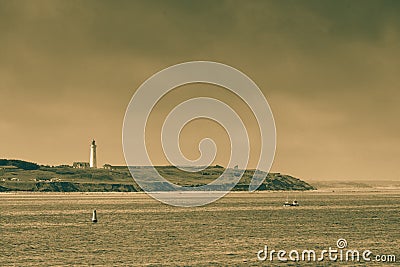 Coastline with lighthouse Hirtshals Denmark Stock Photo