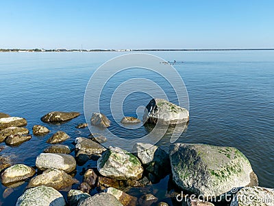 Beautiful seascape with stones, calm autumn day Stock Photo