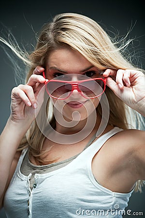 Beautiful seductive blond wearing sunglasses Stock Photo