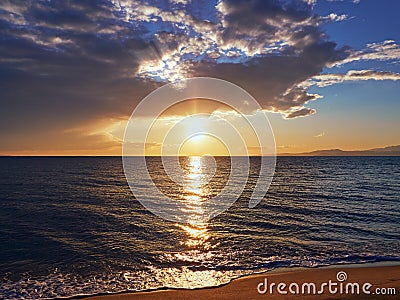 Beautiful and serene sunset on the beach Stock Photo