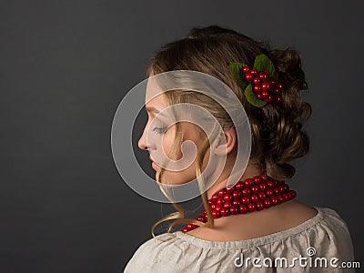 Beautiful serious young woman in Ukrainian embroidery Stock Photo