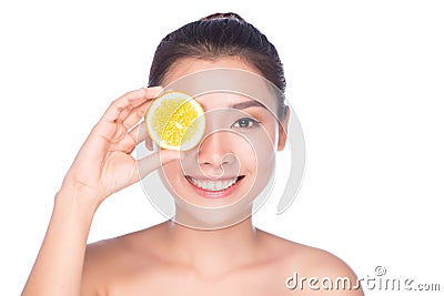 Beautiful brunette woman with citrus on a white background, healthy food, tasty food, organic diet, smile healthy Stock Photo