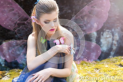 Beautiful cute gentle girl elf butterfly Stock Photo