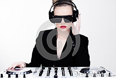 Beautiful disc jockey at her deck Stock Photo