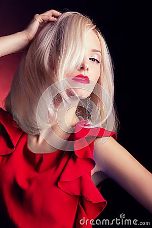 https://thumbs.dreamstime.com/x/beautiful-sexy-elegant-striking-blonde-woman-bright-makeup-red-lips-red-dress-studio-black-background-46438322.jpg