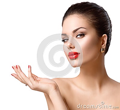 Beautiful girl showing copy space on the open hand Stock Photo