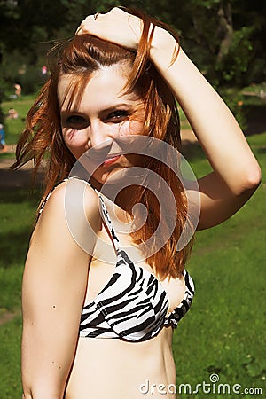 Beautiful red womani on sea beach Stock Photo