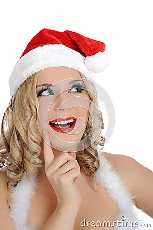 Beautiful santa clause woman in party red hat Stock Photo