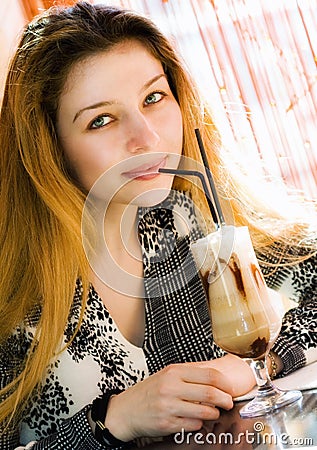 Beautiful woman drinking latte coffee Stock Photo