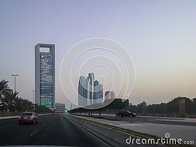 Beautiful shot of Abu Dhabi city street and Etihad towers at sunset Editorial Stock Photo