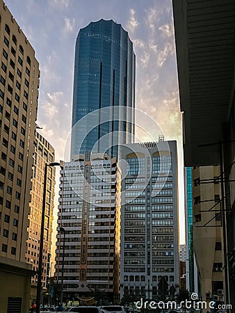 Beautiful shot of Abu Dhabi corniche towers and the WTC on a cloudy sunset Editorial Stock Photo
