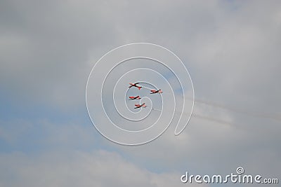 Beautiful shot of five warplanes in the sky going in the same direction. Stock Photo